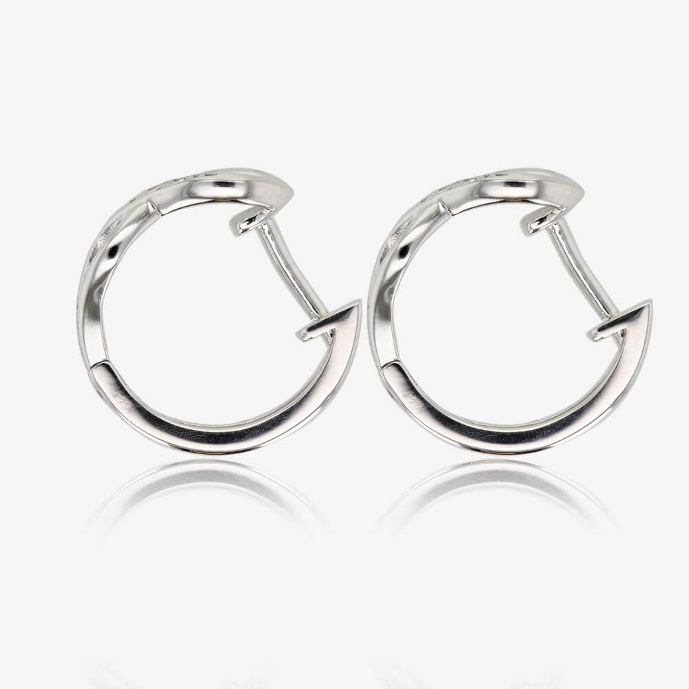 Sterling Silver Diamond Infinity Huggie Earrings at Warren James